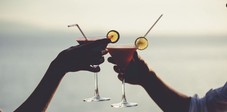 romantic-couple-enjoy-sunset-in-restaurant-on-the-beach-drinking-cocktails-3-2-2